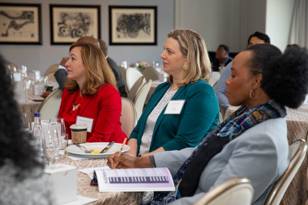 People appearing attentive at conference